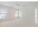 Bright bedroom featuring a ceiling fan and neutral color palette at 3853 Bordeaux Dr, Punta Gorda, FL 33950