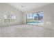 Bright Gathering room with large window, slider to the pool at 3853 Bordeaux Dr, Punta Gorda, FL 33950