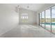 Gathering room with vaulted ceiling, pool view and sliders at 3853 Bordeaux Dr, Punta Gorda, FL 33950