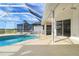 Relaxing pool area with screened enclosure at 3853 Bordeaux Dr, Punta Gorda, FL 33950