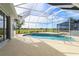Relaxing screened pool area with golf course view at 3853 Bordeaux Dr, Punta Gorda, FL 33950