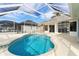 Inviting pool with screened patio at 3853 Bordeaux Dr, Punta Gorda, FL 33950