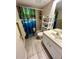 Clean bathroom with shower/tub combo and a white vanity at 1354 Rock Dove Ct # A202, Punta Gorda, FL 33950