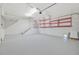 Spacious garage with built-in shelving and storage at 17434 Boca Vista Rd # 1006, Punta Gorda, FL 33955