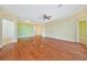 Spacious living area with hardwood floors and ceiling fan at 17434 Boca Vista Rd # 1006, Punta Gorda, FL 33955