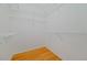 Walk-in closet with wire shelving at 17434 Boca Vista Rd # 1006, Punta Gorda, FL 33955