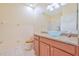 Bathroom with granite vanity, glass sink, and tiled shower at 17434 Boca Vista Rd # 1006, Punta Gorda, FL 33955