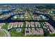 Aerial view showcasing waterfront property, boating, canal, and a desirable residential neighborhood at 1429 Blue Jay Ct, Punta Gorda, FL 33950