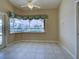 Bright dining area featuring tiled flooring with view of the canal at 1429 Blue Jay Ct, Punta Gorda, FL 33950