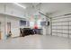 Clean garage features ample space, a workbench, storage cabinets, and a garage door at 1429 Blue Jay Ct, Punta Gorda, FL 33950