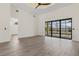 Spacious living area with pool access and tile flooring at 24237 San Lucas Ln, Punta Gorda, FL 33955