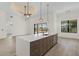 Modern kitchen island with white quartz countertop at 24237 San Lucas Ln, Punta Gorda, FL 33955