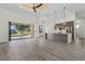 Open concept kitchen with island and stainless steel appliances at 24237 San Lucas Ln, Punta Gorda, FL 33955
