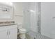 Bathroom with granite vanity and walk-in shower at 24237 San Lucas Ln, Punta Gorda, FL 33955
