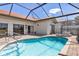 Private pool and spa with screened enclosure and spacious patio at 5081 San Rocco Ct, Punta Gorda, FL 33950