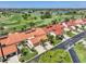 Aerial view of community homes near a golf course at 5081 San Rocco Ct, Punta Gorda, FL 33950