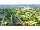 Aerial view showcasing a house and surrounding neighborhood at 66 Wylam Dr, Port Charlotte, FL 33954