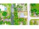 Aerial view of a single story house by the water at 66 Wylam Dr, Port Charlotte, FL 33954
