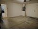 Unfinished garage with potential for workshop at 66 Wylam Dr, Port Charlotte, FL 33954
