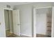 Spacious bedroom with large closet and neutral walls at 66 Wylam Dr, Port Charlotte, FL 33954