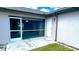 Private screened porch with access to backyard at 66 Wylam Dr, Port Charlotte, FL 33954