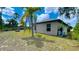 House exterior showcasing a well maintained lawn at 66 Wylam Dr, Port Charlotte, FL 33954
