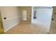 Dining area with tile flooring and access to other rooms at 66 Wylam Dr, Port Charlotte, FL 33954
