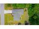 Top-down view of a single-story house with gray roof and driveway at 66 Wylam Dr, Port Charlotte, FL 33954