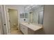 Clean bathroom with single sink vanity, toilet, and tub shower at 66 Wylam Dr, Port Charlotte, FL 33954