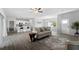 Open concept living room featuring kitchen and dining area views at 14242 Imlay Ave, Port Charlotte, FL 33981
