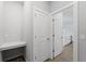 Laundry area with built-in counter and access to kitchen at 14242 Imlay Ave, Port Charlotte, FL 33981