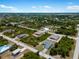 Wide aerial view showcasing a neighborhood of single-Gathering homes at 13409 Warba Ave, Port Charlotte, FL 33981