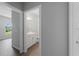 Clean bathroom with white vanity and toilet at 13409 Warba Ave, Port Charlotte, FL 33981