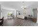 Open living room and dining area with tile floors at 13409 Warba Ave, Port Charlotte, FL 33981