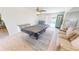 Game room boasts a pool table and access to the pool at 22260 Aburto Ln, Port Charlotte, FL 33952