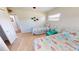 Guest bedroom with two twin beds and access to a bathroom at 22260 Aburto Ln, Port Charlotte, FL 33952