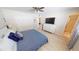 Comfortable bedroom with king-size bed and ensuite bath at 22260 Aburto Ln, Port Charlotte, FL 33952