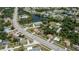Aerial view showcasing home's location near water and road at 20567 Midway Blvd, Port Charlotte, FL 33952