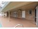 Covered patio overlooking the pool, offering ample space for relaxation at 20567 Midway Blvd, Port Charlotte, FL 33952