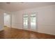 Living room with pool view, tile floors and french doors at 20567 Midway Blvd, Port Charlotte, FL 33952