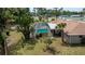 Property overview showing the house and pool from above at 20567 Midway Blvd, Port Charlotte, FL 33952