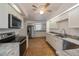 Modern kitchen featuring stainless steel appliances and granite countertops at 20567 Midway Blvd, Port Charlotte, FL 33952