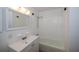 Bathroom with white vanity and shower/tub combo at 20567 Midway Blvd, Port Charlotte, FL 33952