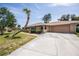 Brick ranch house with attached garage at 20567 Midway Blvd, Port Charlotte, FL 33952