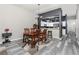 Elegant dining room with hardwood floors and chandelier at 5115 Melbourne St # A303, Port Charlotte, FL 33980