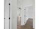 Bright hallway with tile floors and access to rooms at 12550 Mohican Ave, Port Charlotte, FL 33953