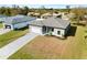 Single-Gathering home with a two-car garage and paver driveway at 12550 Mohican Ave, Port Charlotte, FL 33953