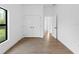Bedroom featuring tile floors and a window at 12550 Mohican Ave, Port Charlotte, FL 33953