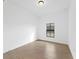 Spacious bedroom with tile floors and a window at 12550 Mohican Ave, Port Charlotte, FL 33953