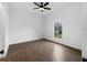 Spacious bedroom with tile flooring and a large window offering natural light at 12550 Mohican Ave, Port Charlotte, FL 33953